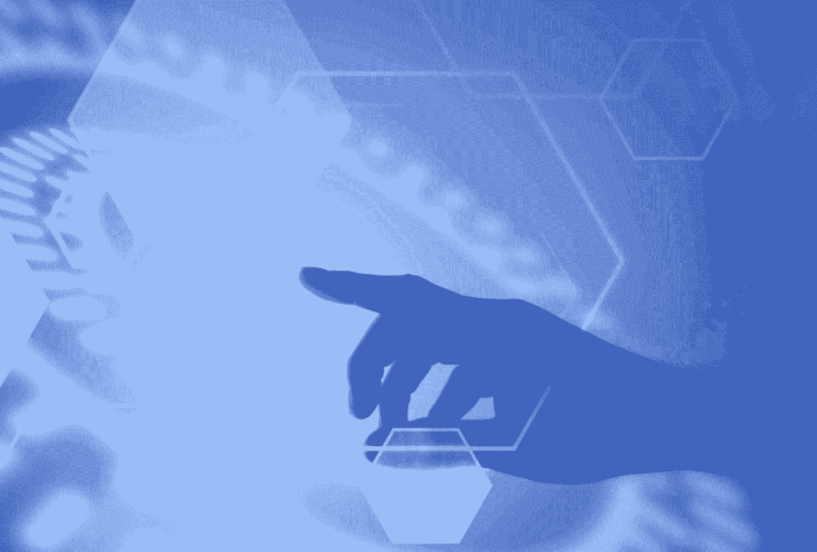 Imagem de uma mão apontando para uma tela